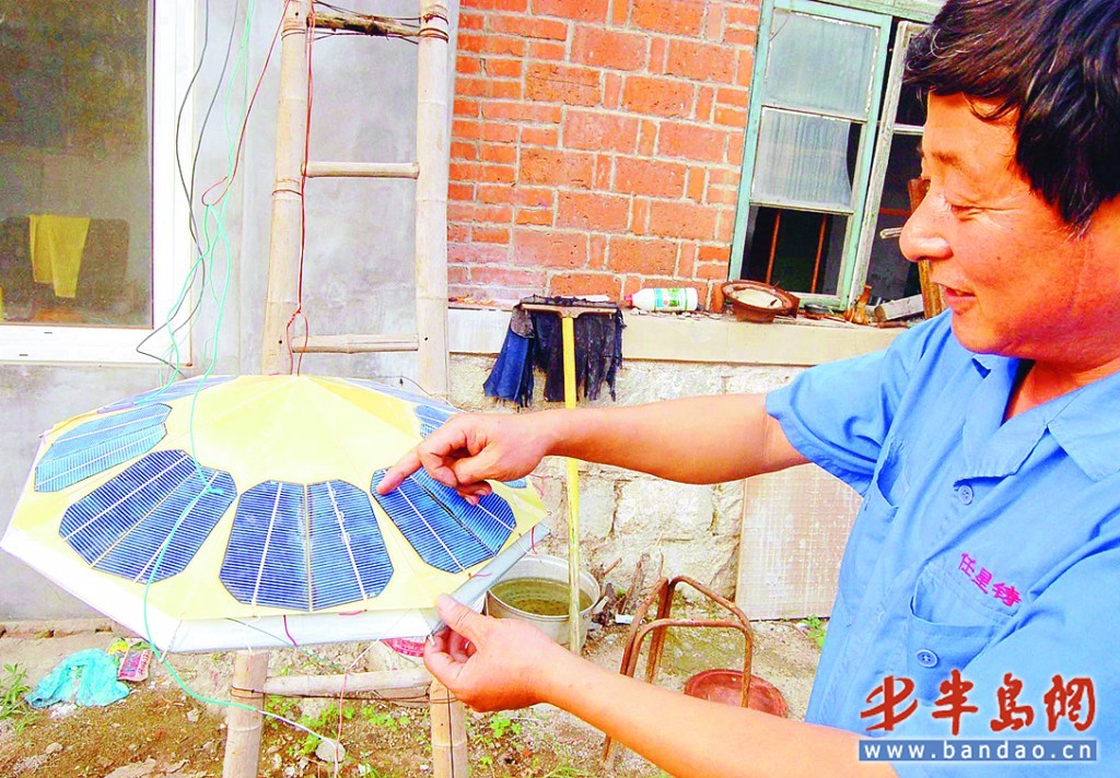 山东农民发明太阳能充电器 能适用各种电器